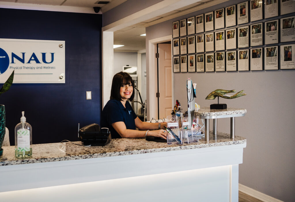 Michelle at the front desk in the NAU lobby